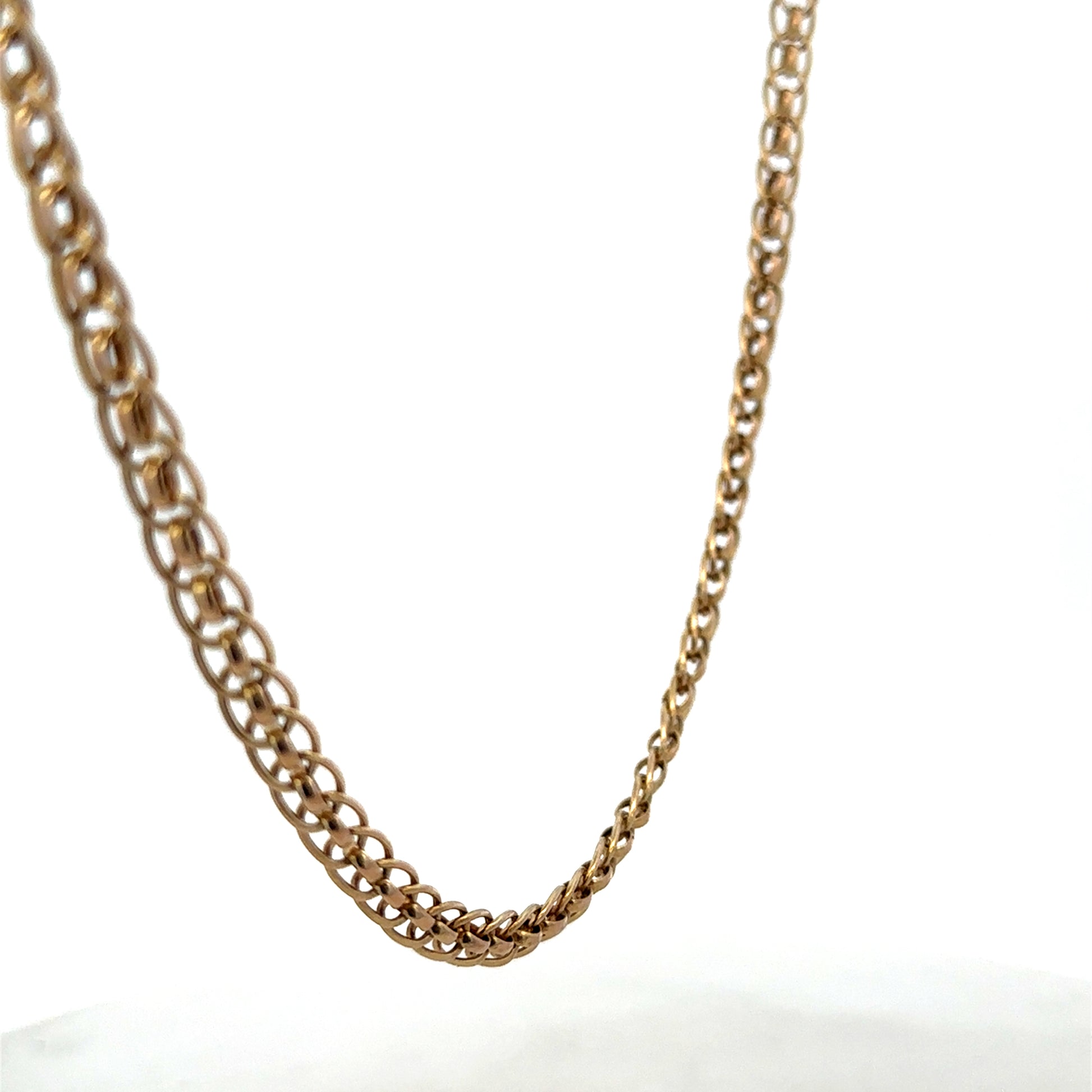 9ct yellow gold double linked chain weighing 7.9g, crafted by Reeves and Sons, shown in close-up image.