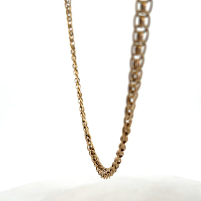 9ct yellow gold double linked chain weighing 7.9g, featuring polished links, from Reeves and Sons.