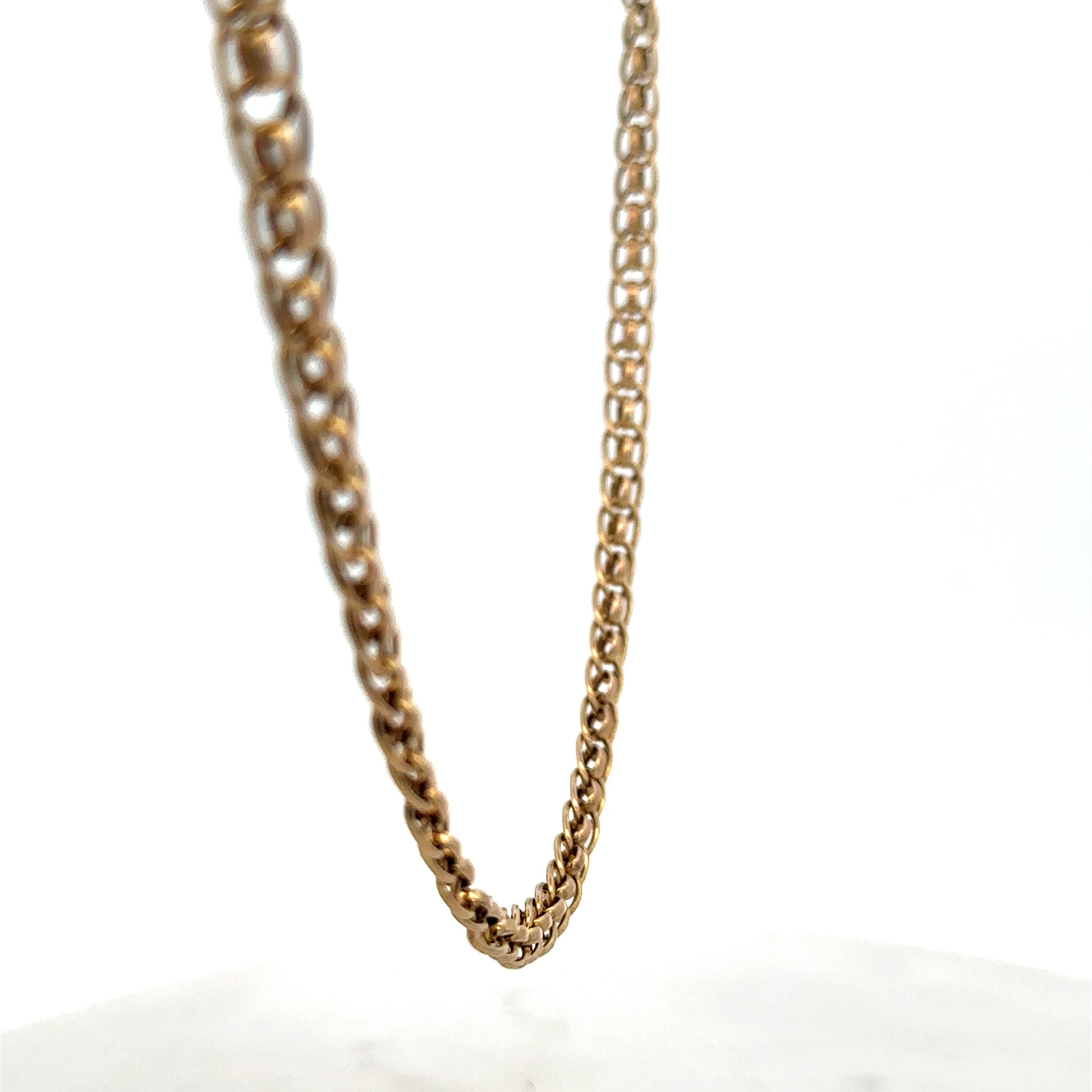 9ct yellow gold double linked chain weighing 7.9g, shown with close-up of intricate links, crafted by Reeves and Sons.