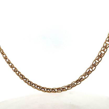 9ct yellow gold double linked chain weighing 7.9g, featuring polished interlinked loops, crafted by Reeves and Sons.