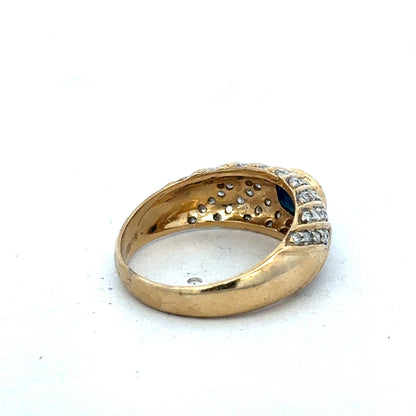 18ct yellow gold diamond ring by Reeves and Sons, size P, featuring a sparkling diamond centerpiece.