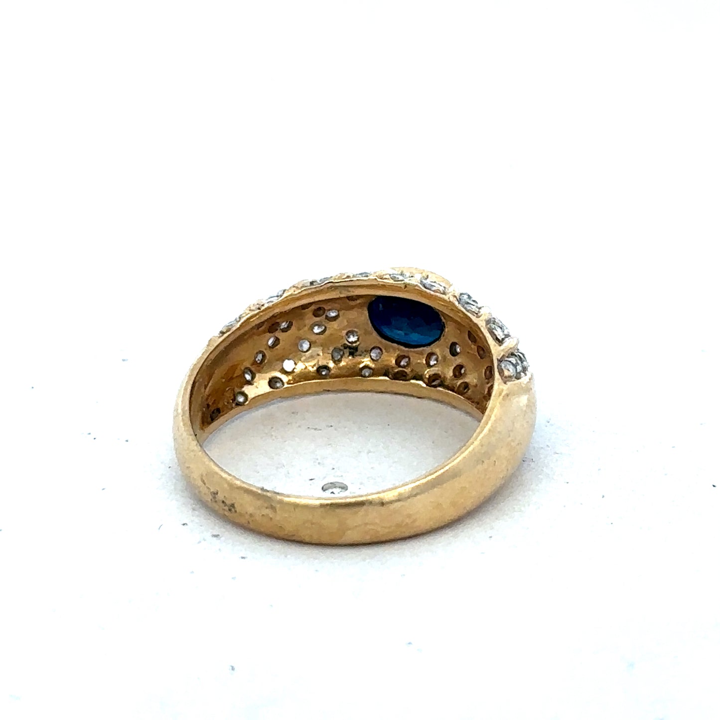 18ct yellow gold diamond ring in size P by Reeves and Sons, featuring a delicate band with sparkling diamonds.