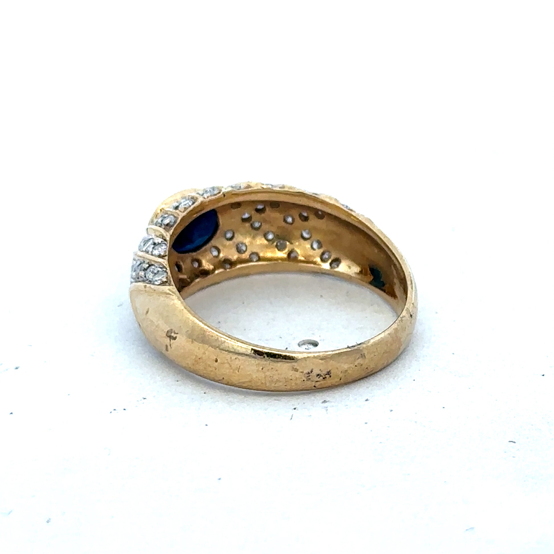 18ct yellow gold diamond ring by Reeves and Sons, size P, featuring a sparkling diamond in a classic band design.