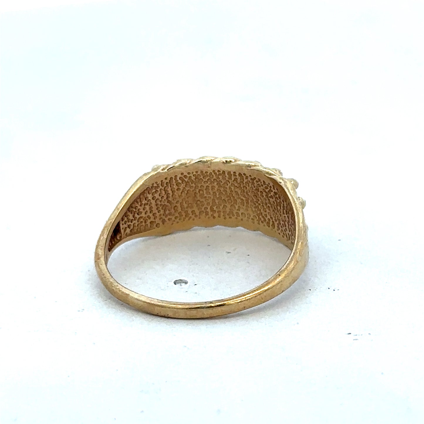 9ct yellow gold keeper ring in size W with a simple band design, crafted by Reeves and Sons.