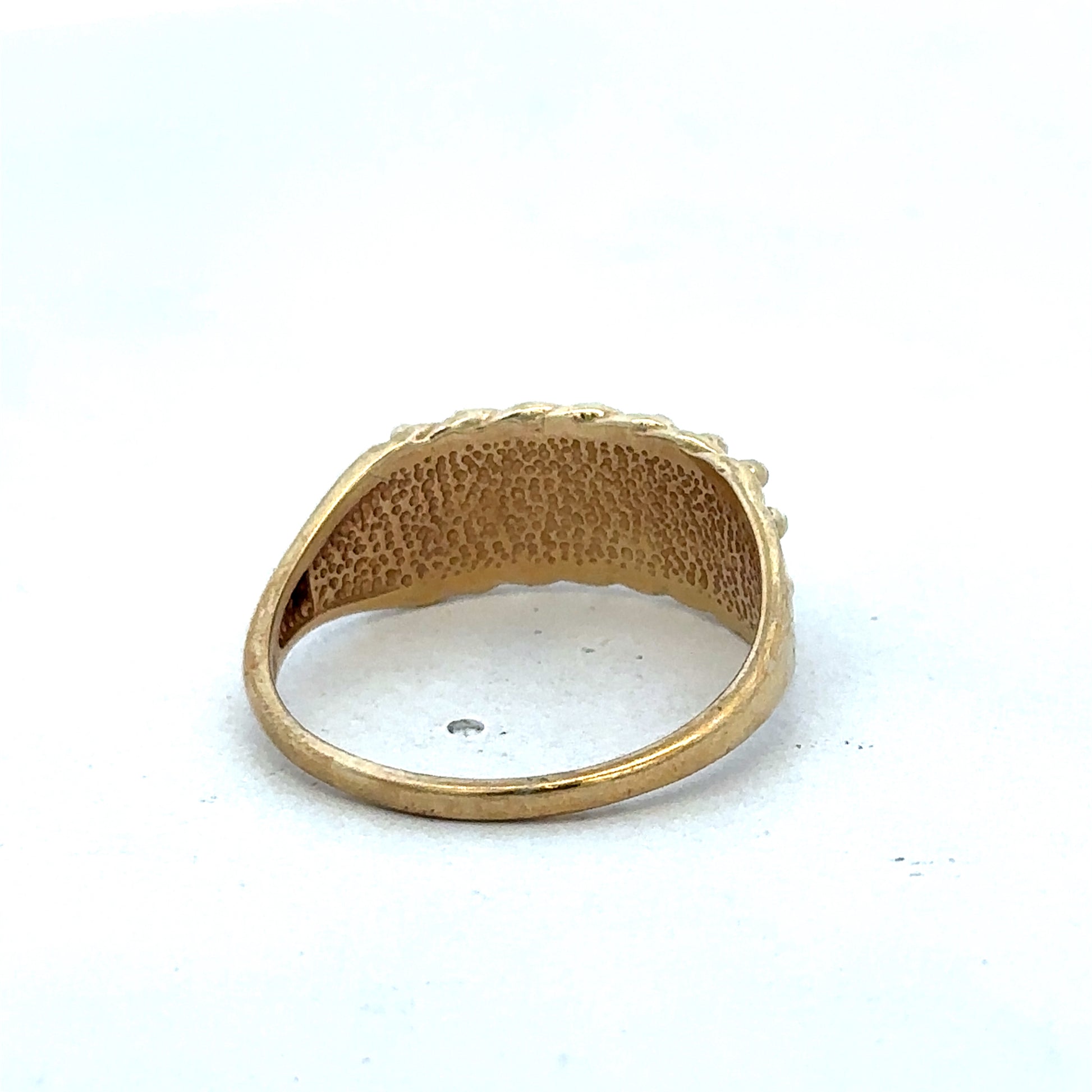 9ct yellow gold keeper ring in size W with a simple band design, crafted by Reeves and Sons.
