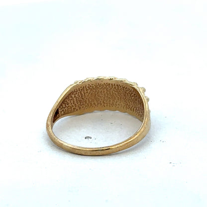 9ct yellow gold keeper ring in size W with a simple band design, crafted by Reeves and Sons.