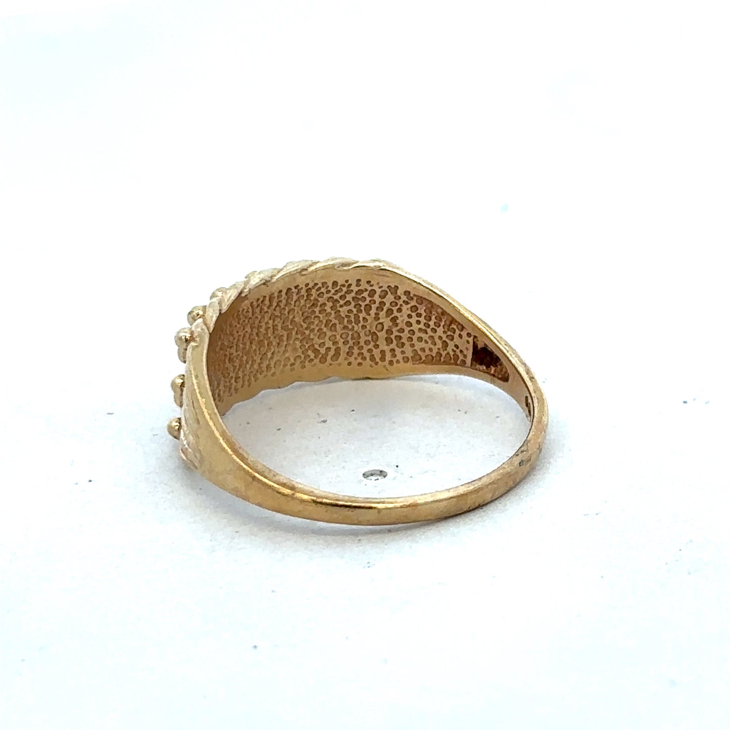 9ct yellow gold keeper ring size W from Reeves and Sons, close-up of polished gold band with detailed craftsmanship.