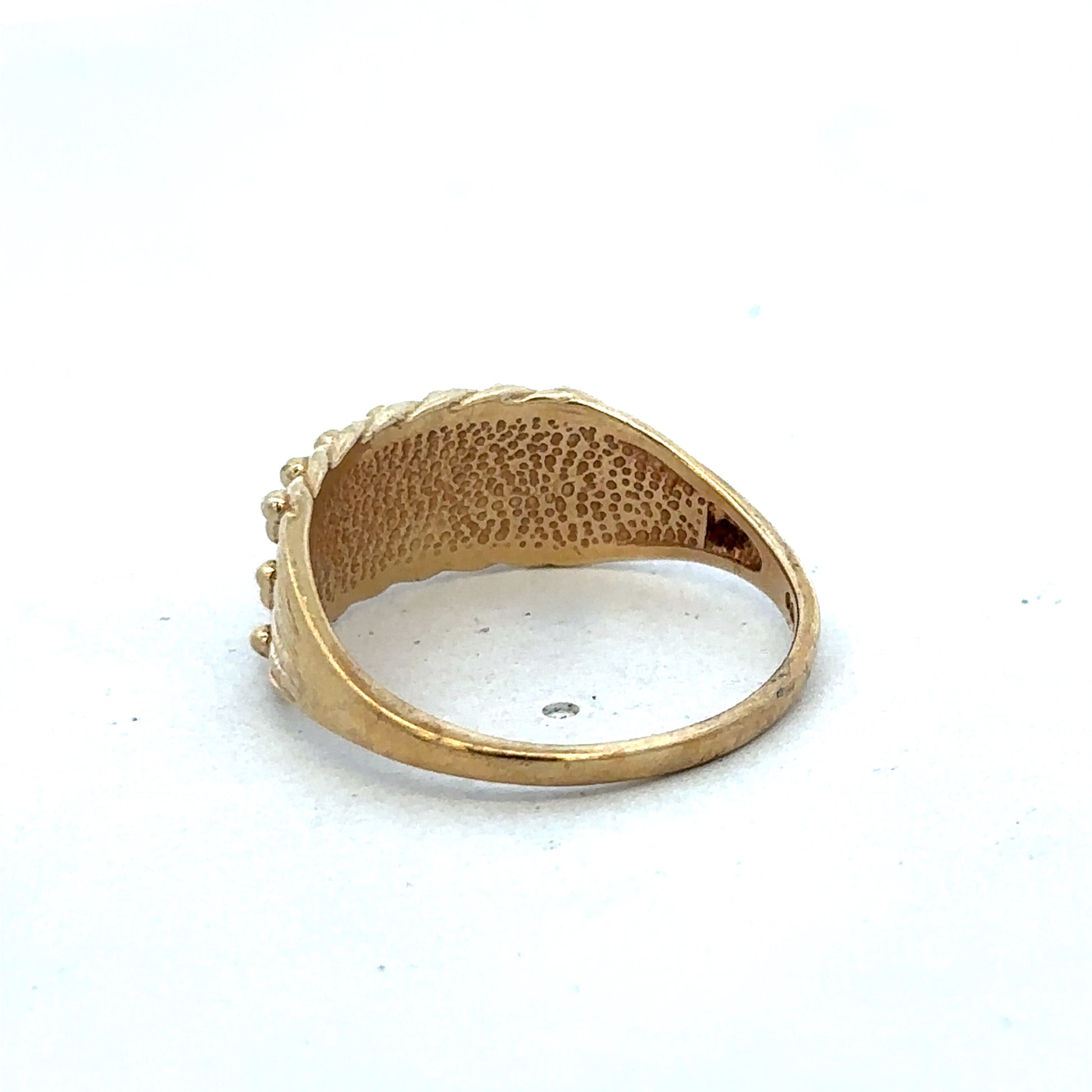 9ct yellow gold keeper ring size W from Reeves and Sons, close-up of polished gold band with detailed craftsmanship.