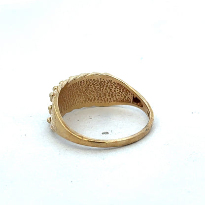 9ct yellow gold keeper ring size W from Reeves and Sons, close-up of polished gold band with detailed craftsmanship.