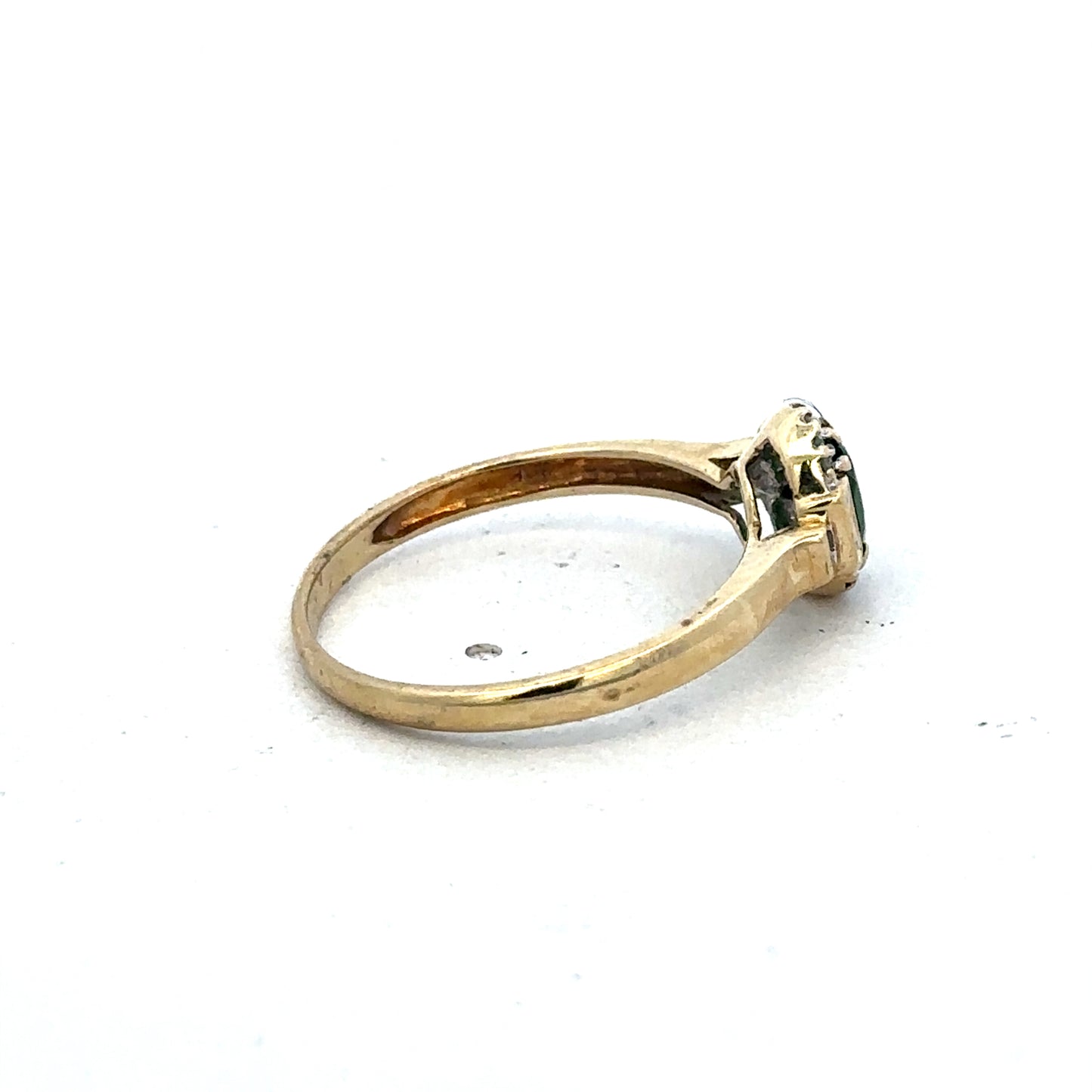 9ct yellow gold emerald and diamond ring by Reeves and Sons, size R, featuring a central emerald and sparkling diamonds.