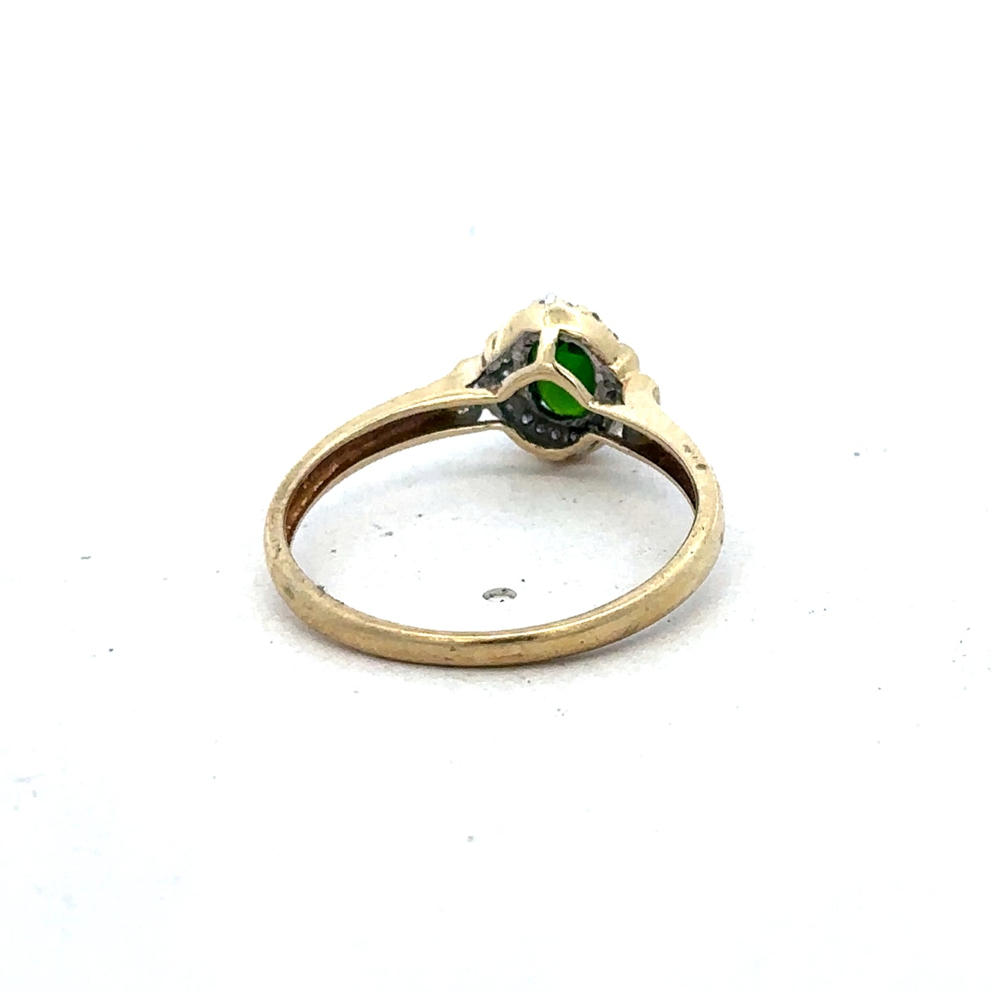 9ct yellow gold emerald and diamond ring in size R with intricate detailing, crafted by Reeves and Sons.