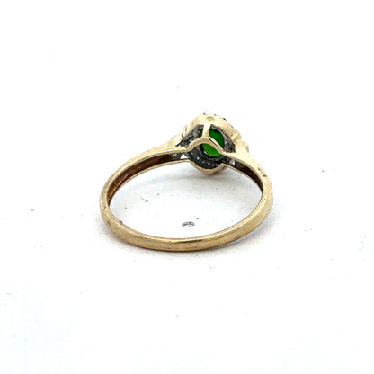 9ct yellow gold emerald and diamond ring in size R with intricate detailing, crafted by Reeves and Sons.