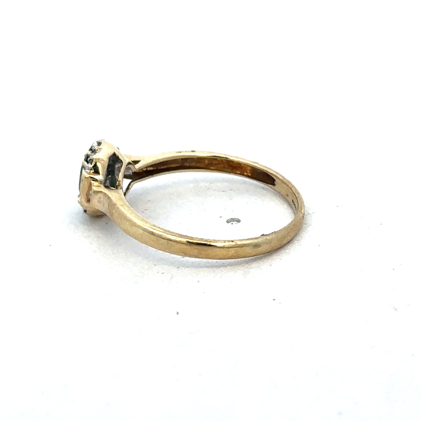 9ct yellow gold emerald and diamond ring with intricate band design, size R, by Reeves and Sons.