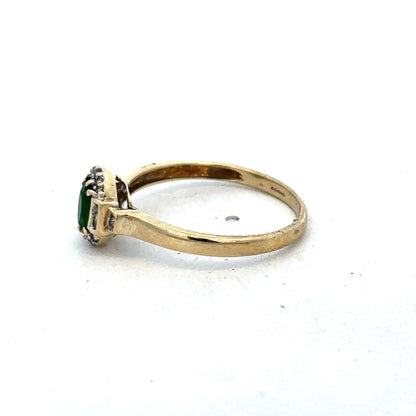 9ct yellow gold emerald and diamond ring, size R, by Reeves and Sons, showcasing a detailed design with sparkling gemstones.