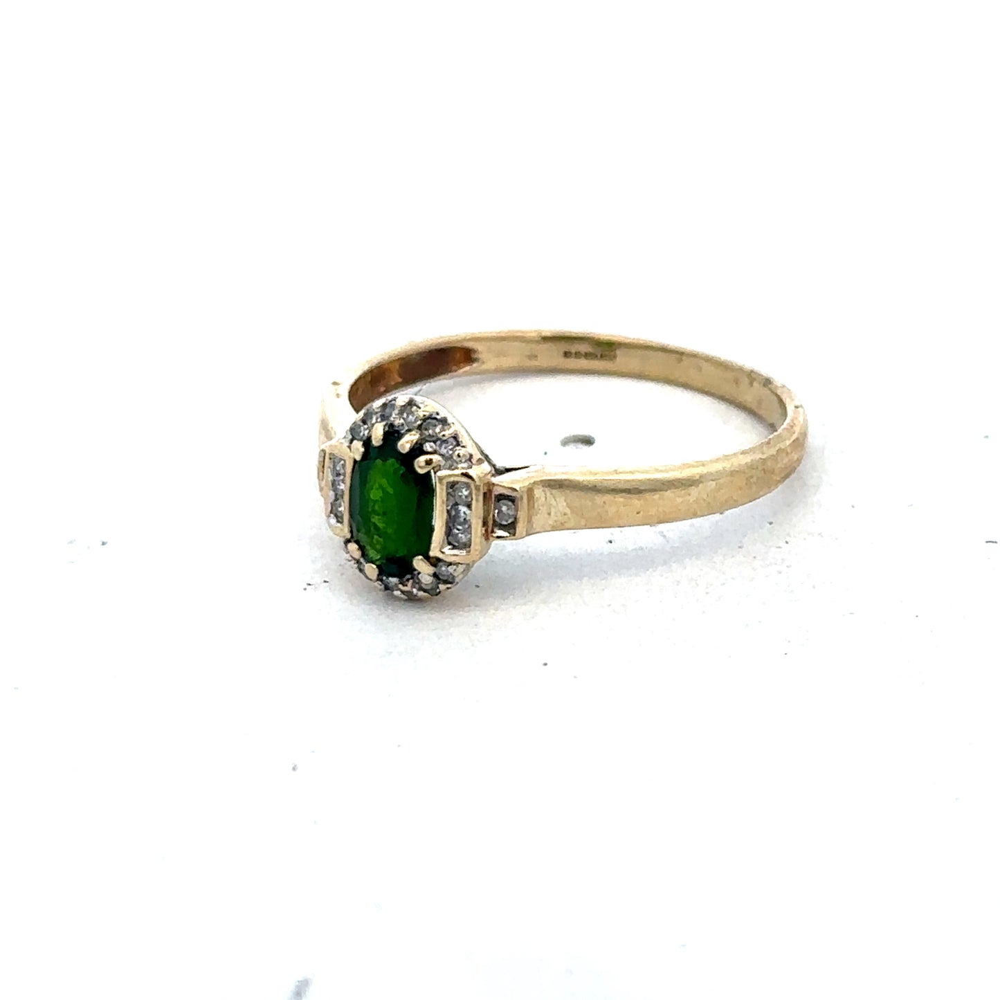 9ct yellow gold emerald and diamond ring with size R, featuring intricate design and sparkling gemstones from Reeves and Sons.