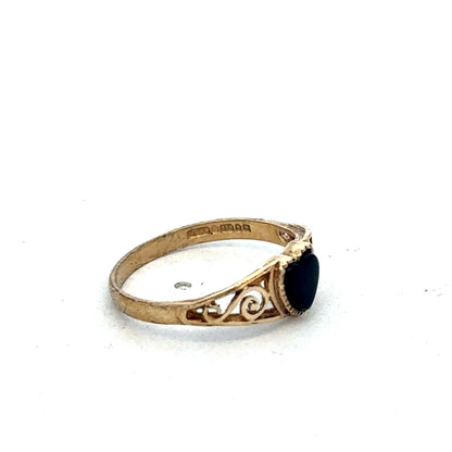 9ct yellow gold ring in size L by Reeves and Sons, featuring a smooth polished band, photographed on a plain background.
