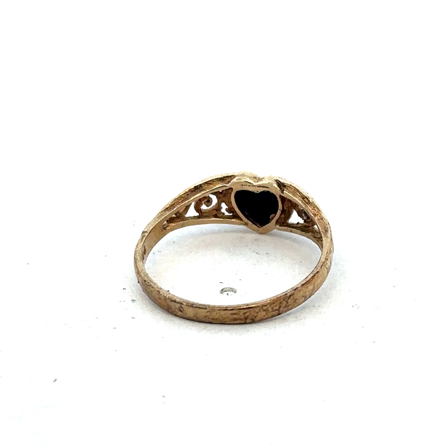 9ct yellow gold ring size L by Reeves and Sons, close-up view showing smooth band and polished finish.
