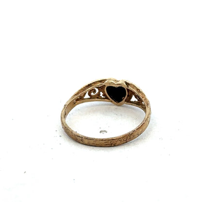 9ct yellow gold ring size L by Reeves and Sons, close-up view showing smooth band and polished finish.