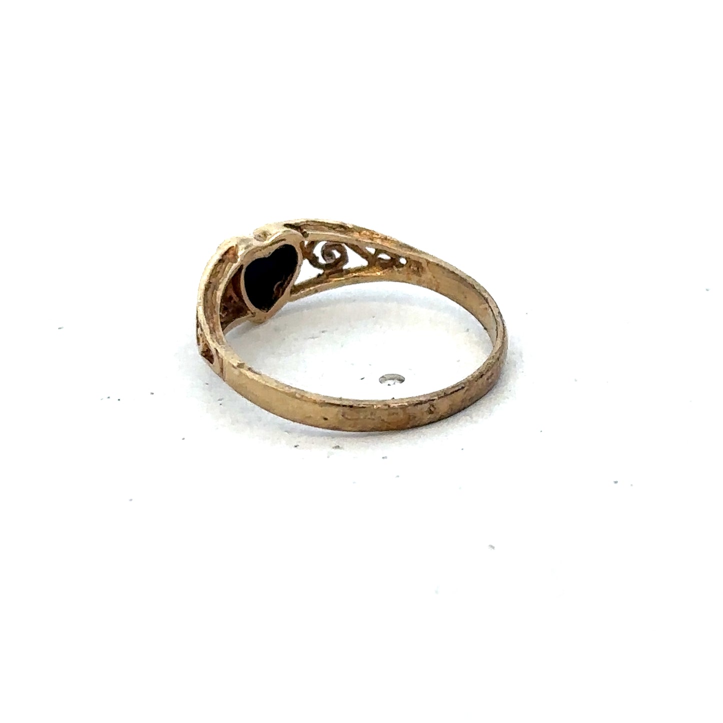 9ct yellow gold ring size L from Reeves and Sons, close-up view showing smooth polished band and subtle shine.
