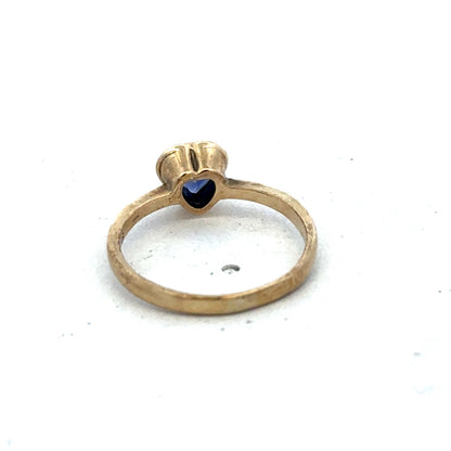9ct yellow gold ring in size J with a smooth band, crafted by Reeves and Sons.