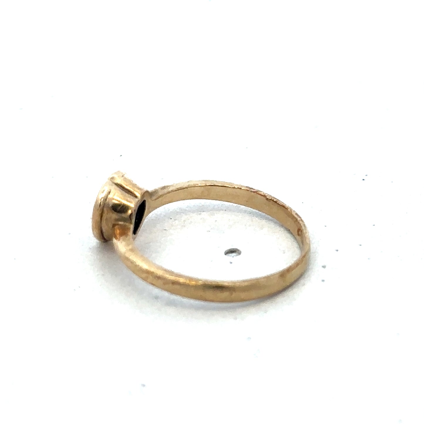 9ct yellow gold ring in size J by Reeves and Sons, featuring a smooth polished band with subtle shine.