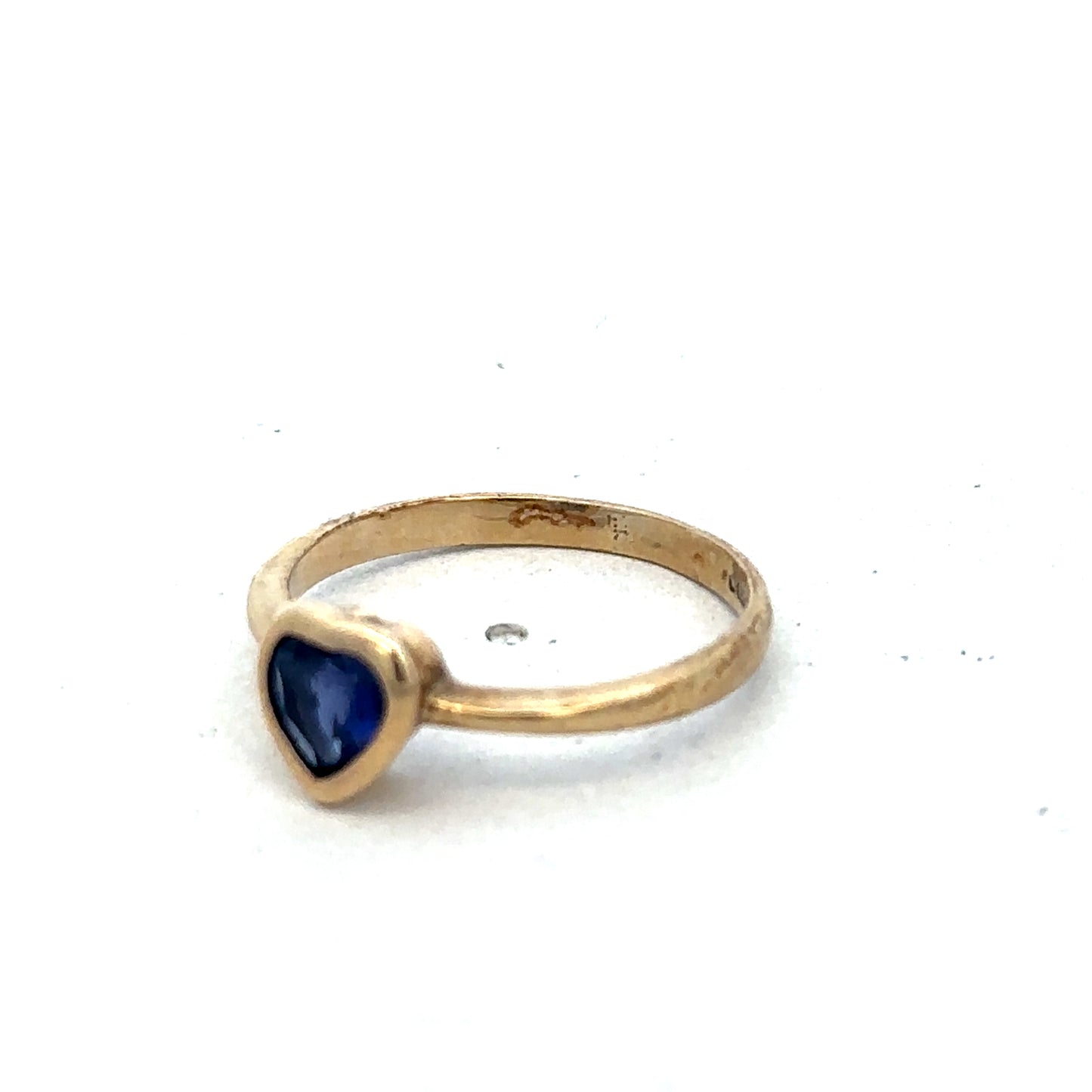 9ct yellow gold ring in size J with a smooth band, crafted by Reeves and Sons.