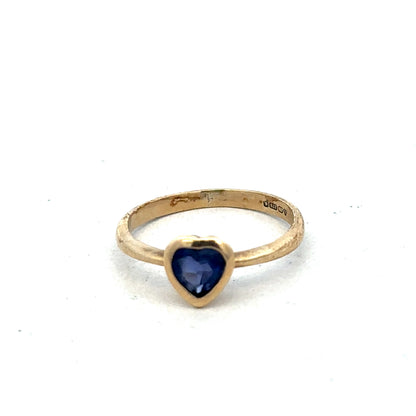 9ct yellow gold ring in size J with a smooth finish, crafted by Reeves and Sons, shown on a neutral background.