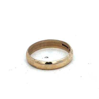 9ct yellow gold band ring in size N with smooth finish, crafted by Reeves and Sons.