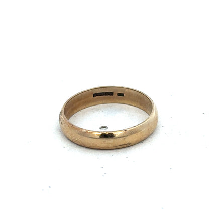 9ct yellow gold band ring in size N with a smooth, polished finish from Reeves and Sons.