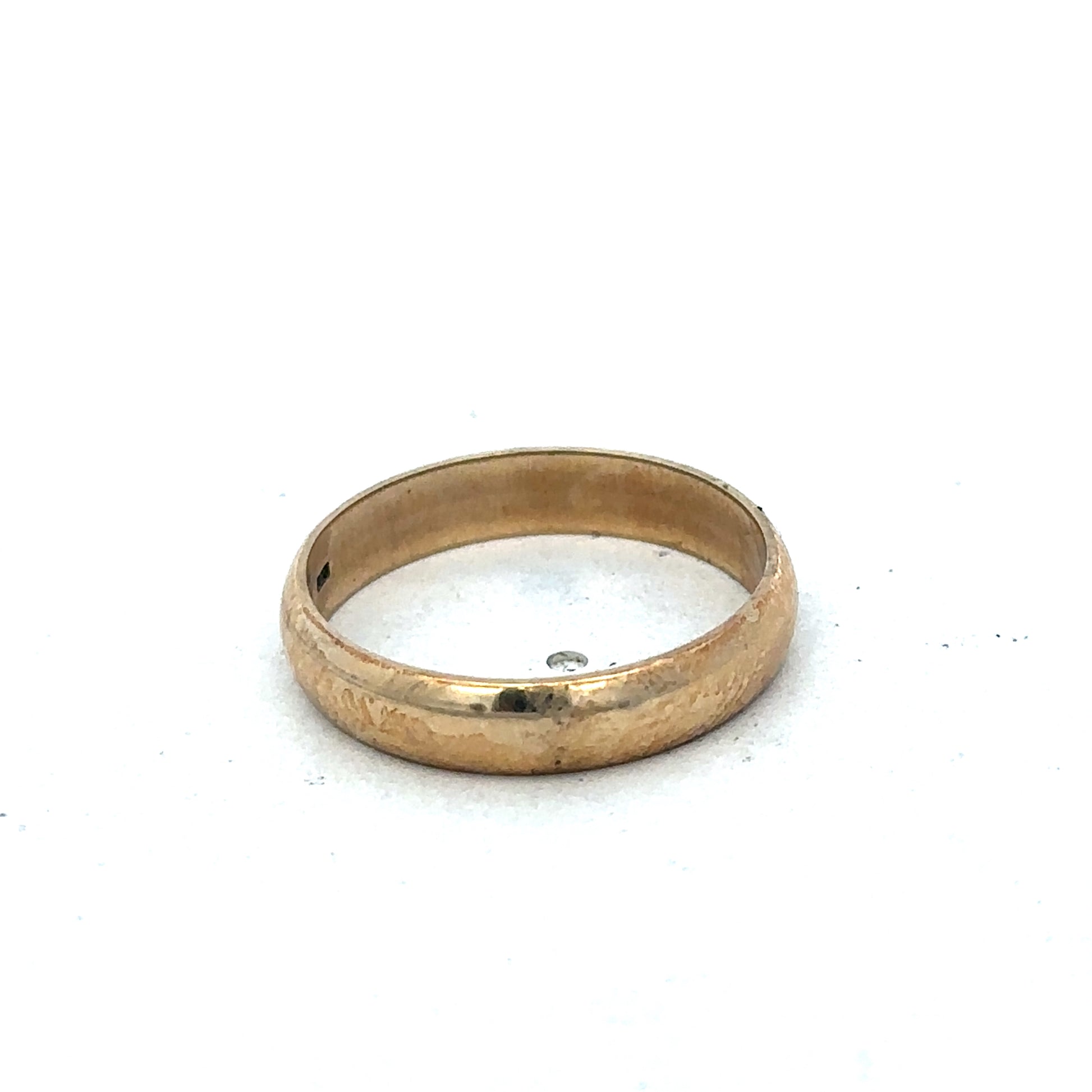 9ct yellow gold band ring in size N with a smooth polished finish, crafted by Reeves and Sons.