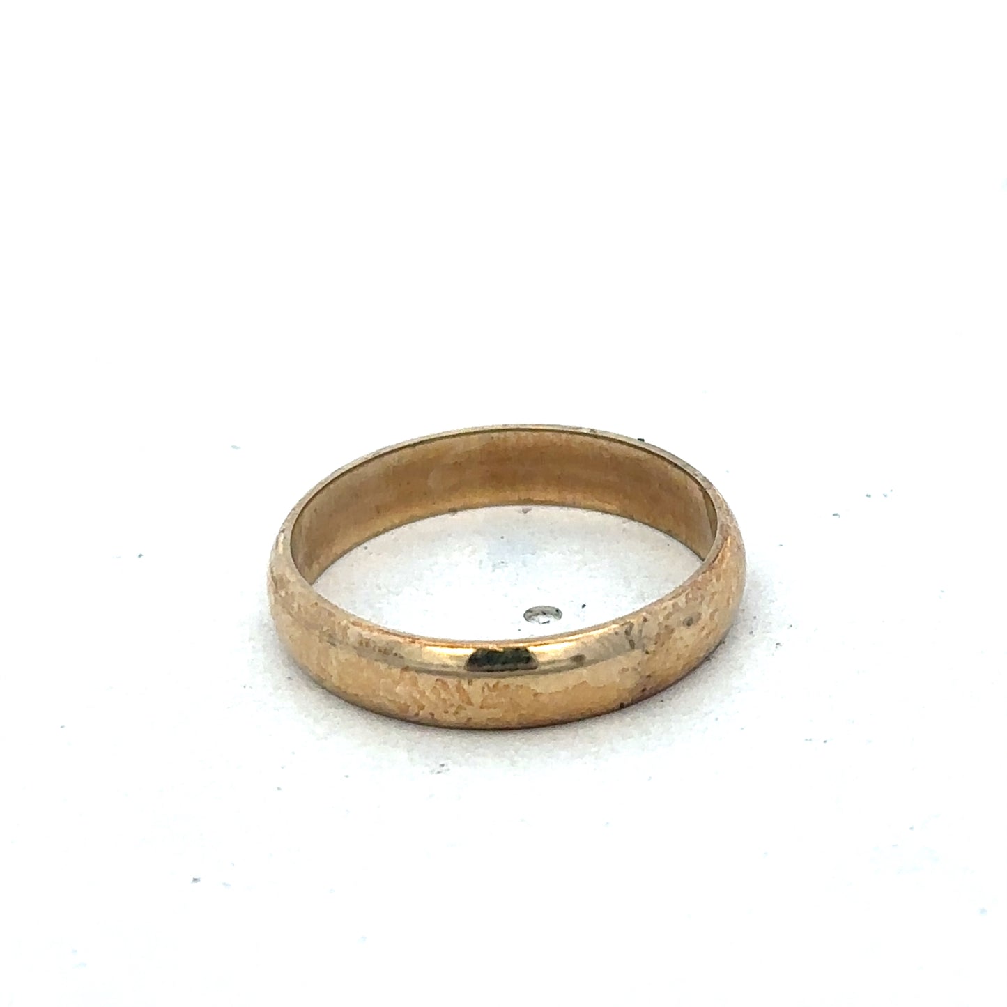 9ct yellow gold band ring in size N by Reeves and Sons, smooth polished finish, close-up view of the elegant jewelry piece.