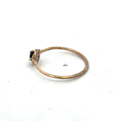 9ct yellow gold ring in size M by Reeves and Sons, featuring a smooth polished band and elegant design.