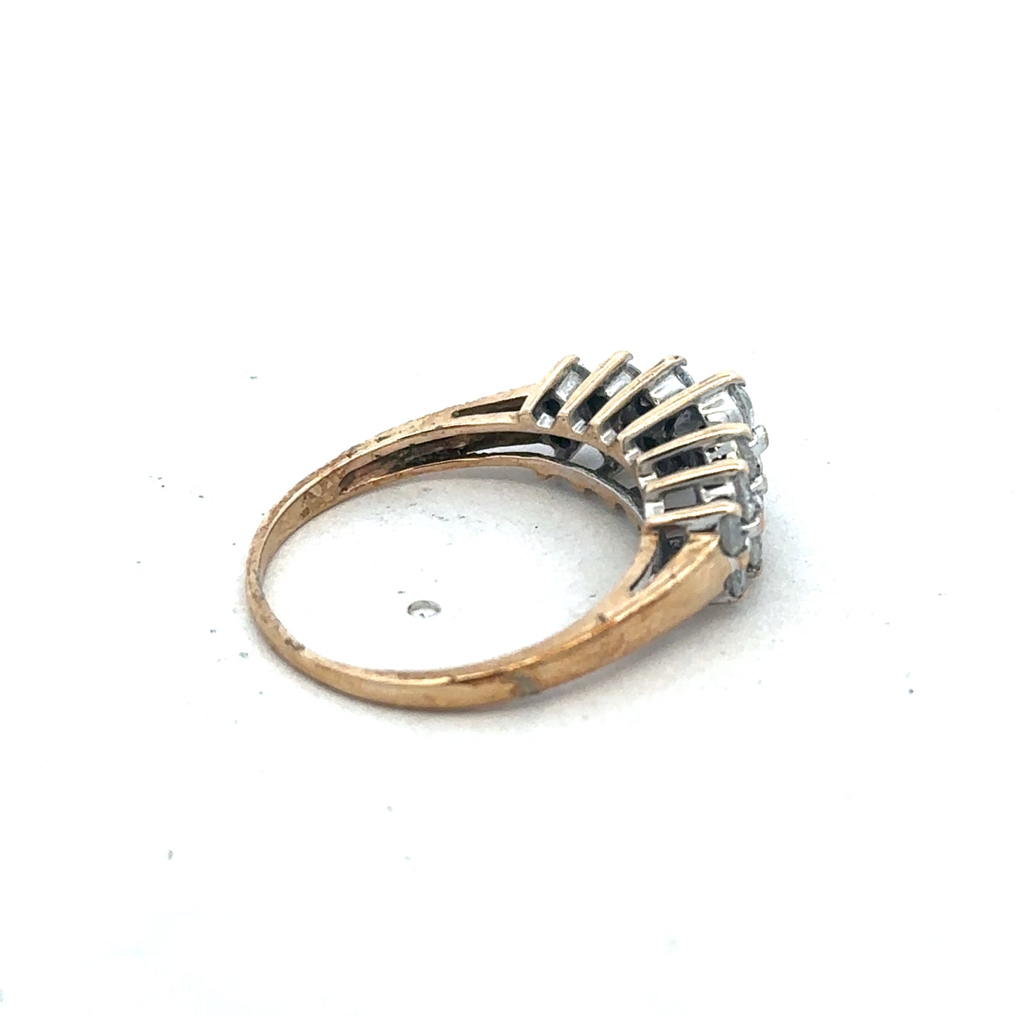 9ct yellow gold ring size N1/2 from Reeves and Sons, with a smooth polished band and intricate design details visible.