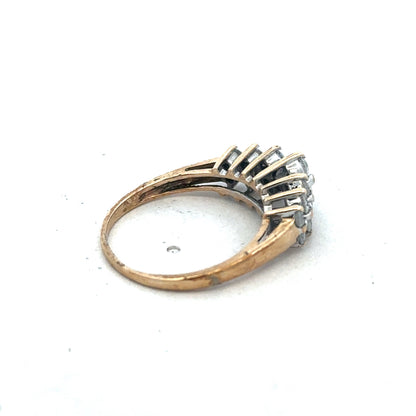 9ct yellow gold ring size N1/2 from Reeves and Sons, with a smooth polished band and intricate design details visible.