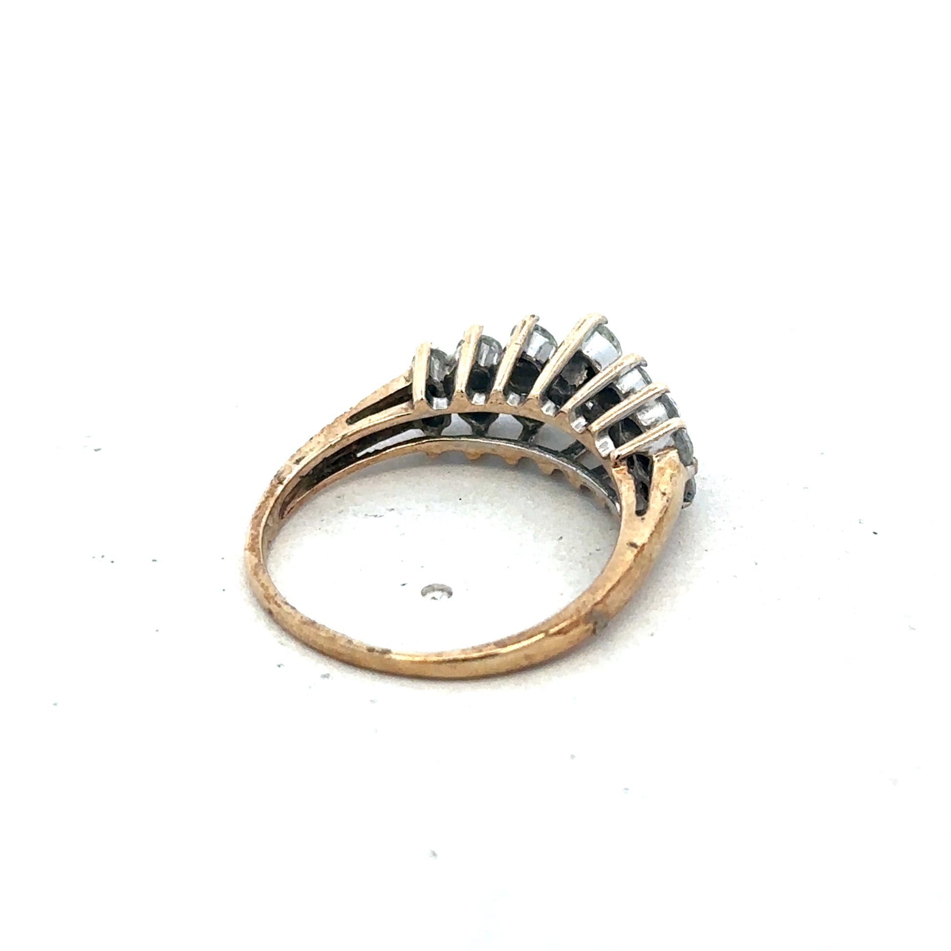 9ct yellow gold ring size N1/2 from Reeves and Sons, featuring a smooth polished band with a classic design.