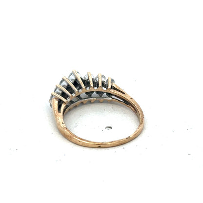 9ct yellow gold ring in size N1/2 with a smooth band, crafted by Reeves and Sons.