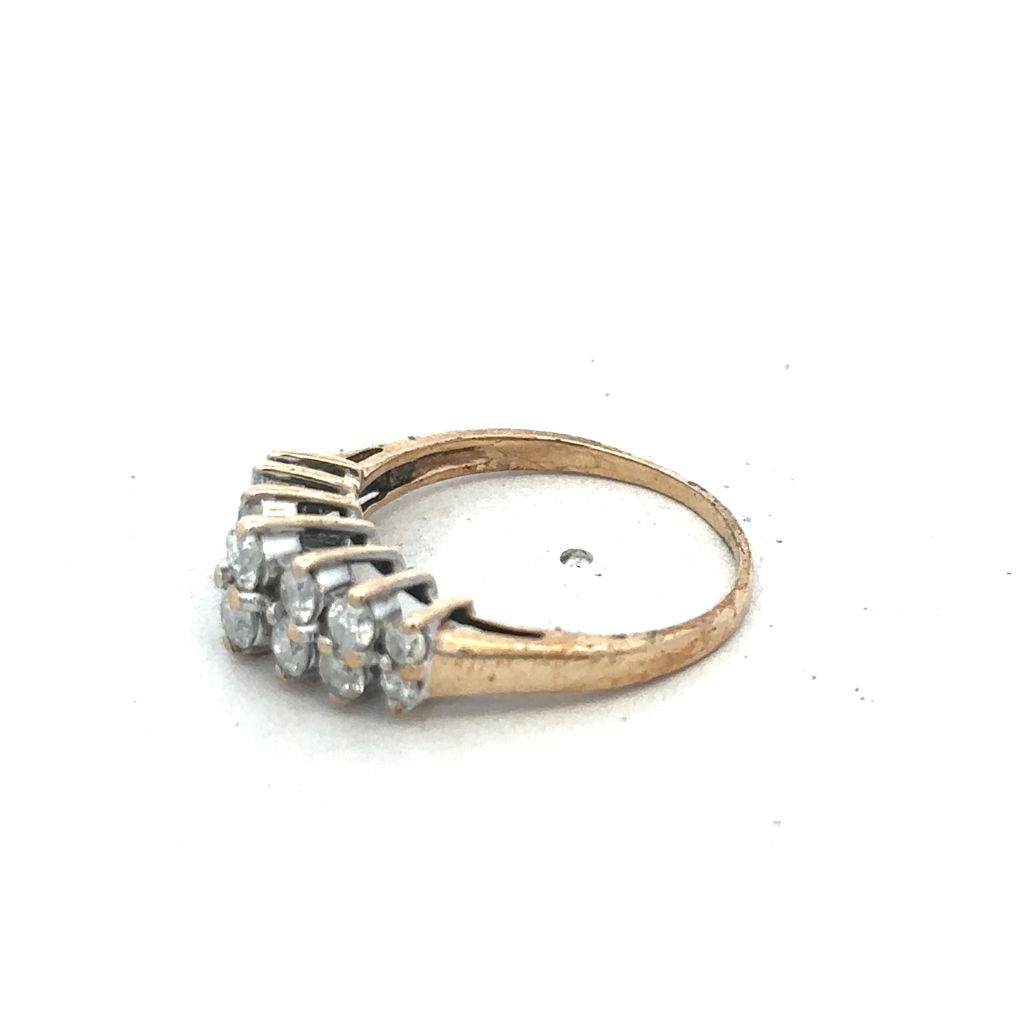 9ct yellow gold ring size N1/2 from Reeves and Sons, showcasing a polished band with subtle design details.