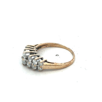 9ct yellow gold ring size N1/2 from Reeves and Sons, showcasing a polished band with subtle design details.