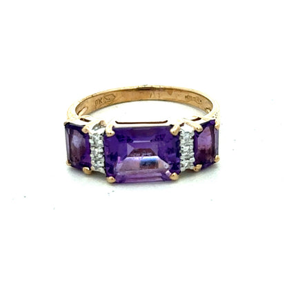 9ct yellow gold amethyst and diamond ring in size N with intricate band design, showcasing a vibrant purple gemstone and sparkling diamonds.
