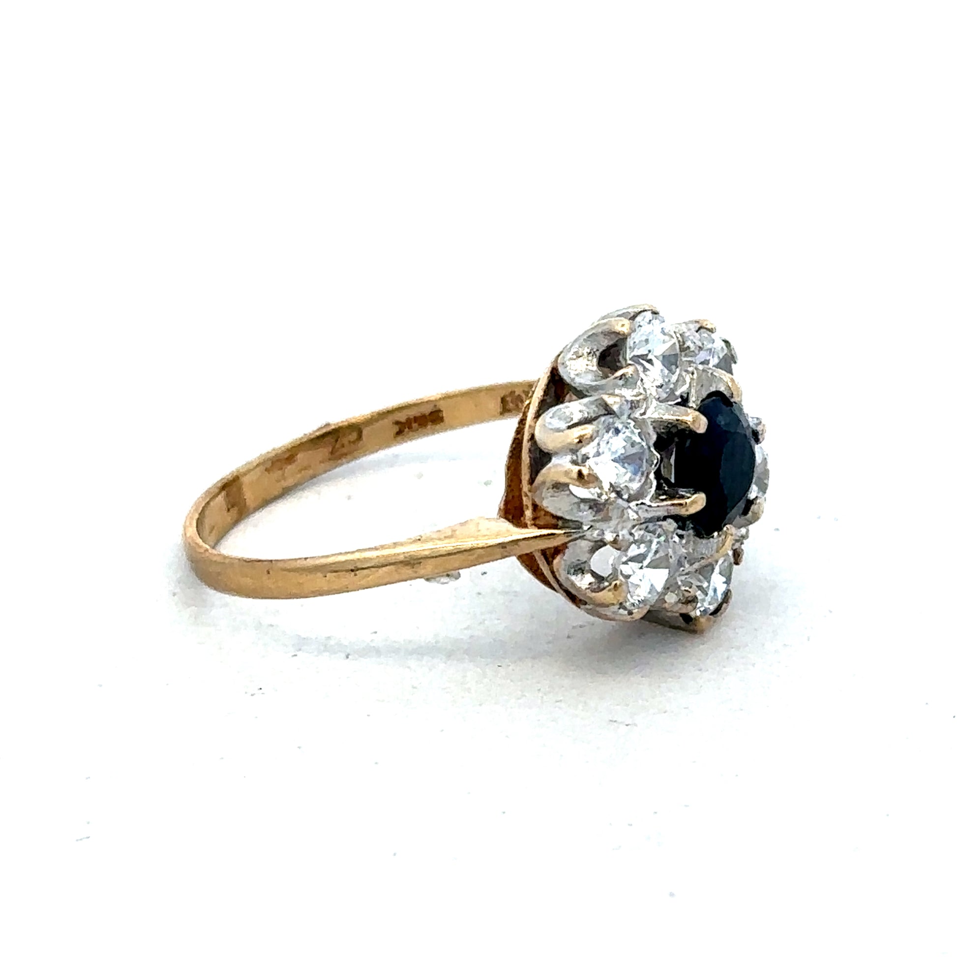 9ct yellow gold ring size O from Reeves and Sons, showcasing a polished band with smooth finish.