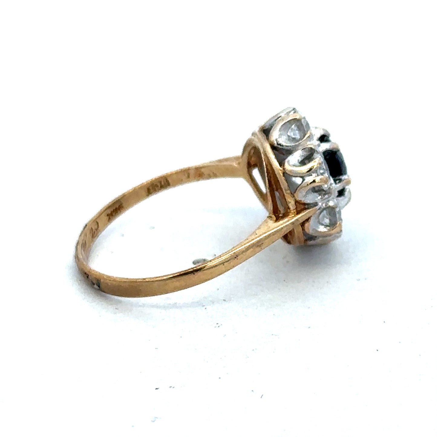 9ct yellow gold ring in size O by Reeves and Sons, featuring a smooth polished band and elegant design.