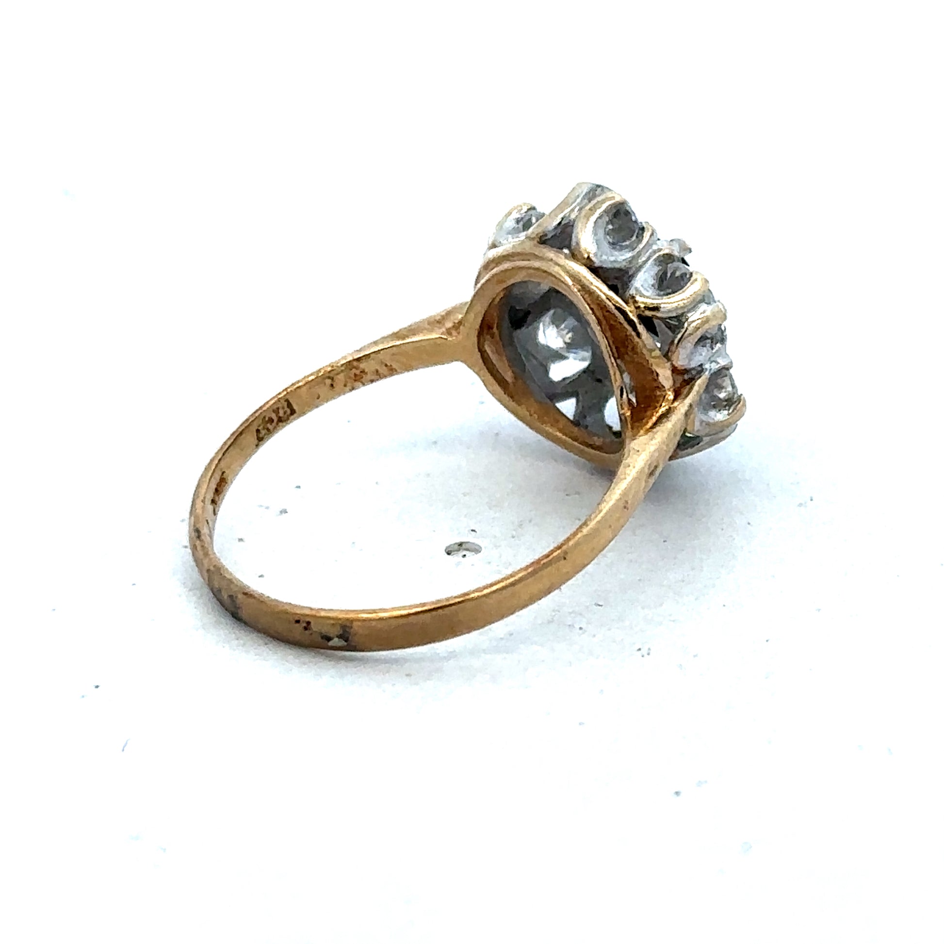 9ct yellow gold ring in size O with a smooth polished band, crafted by Reeves and Sons.