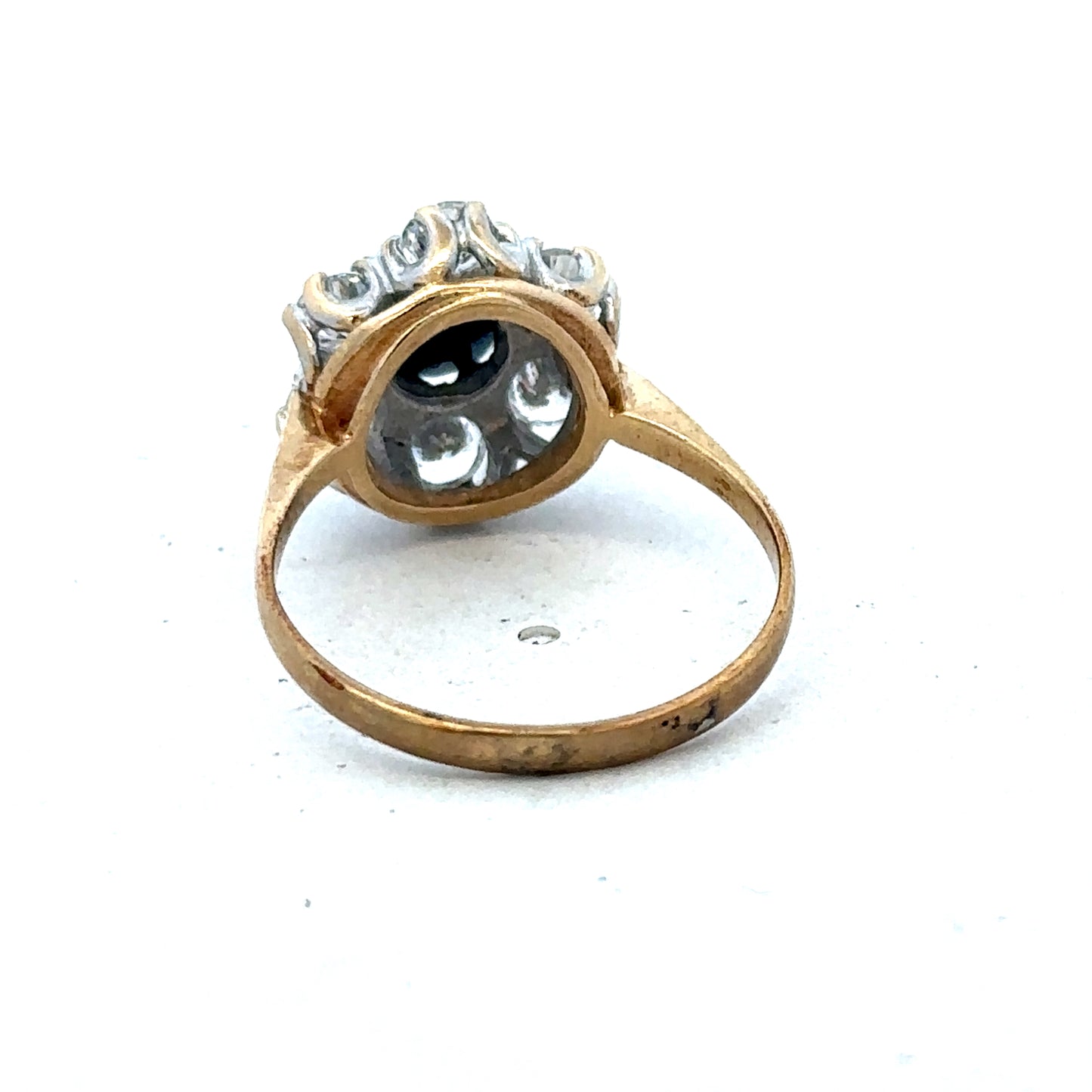9ct yellow gold ring in size O from Reeves and Sons, showcasing a smooth polished band on a plain background.