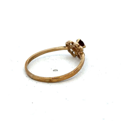 9ct yellow gold ring in size M with a smooth band, crafted by Reeves and Sons, shown on a neutral background.