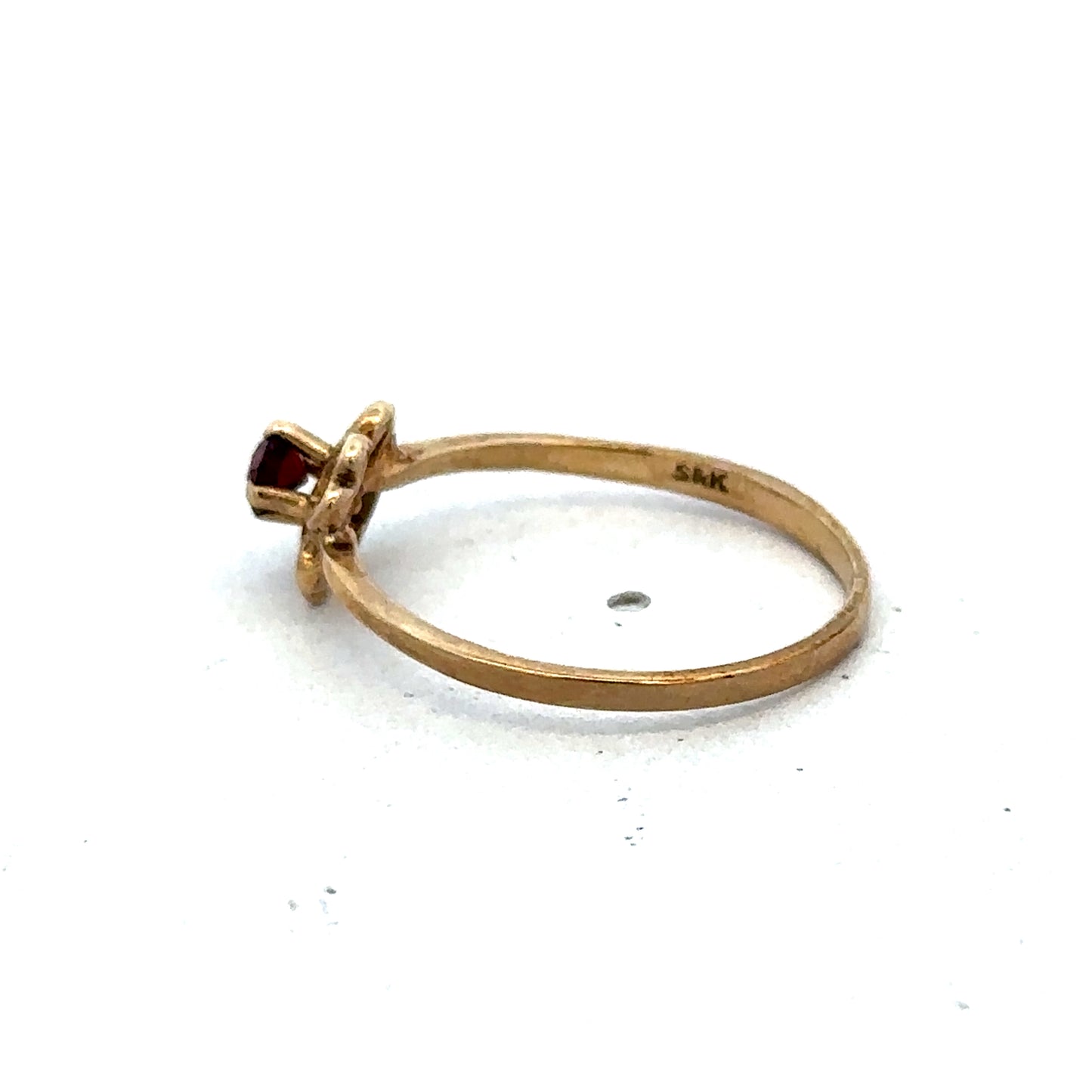 9ct yellow gold ring in size M by Reeves and Sons, featuring a smooth polished band and classic design.