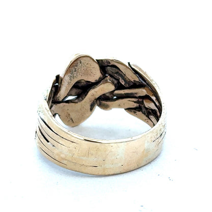 9ct yellow gold puzzle ring size U by Reeves and Sons, featuring interlocking band design, shiny polished finish.
