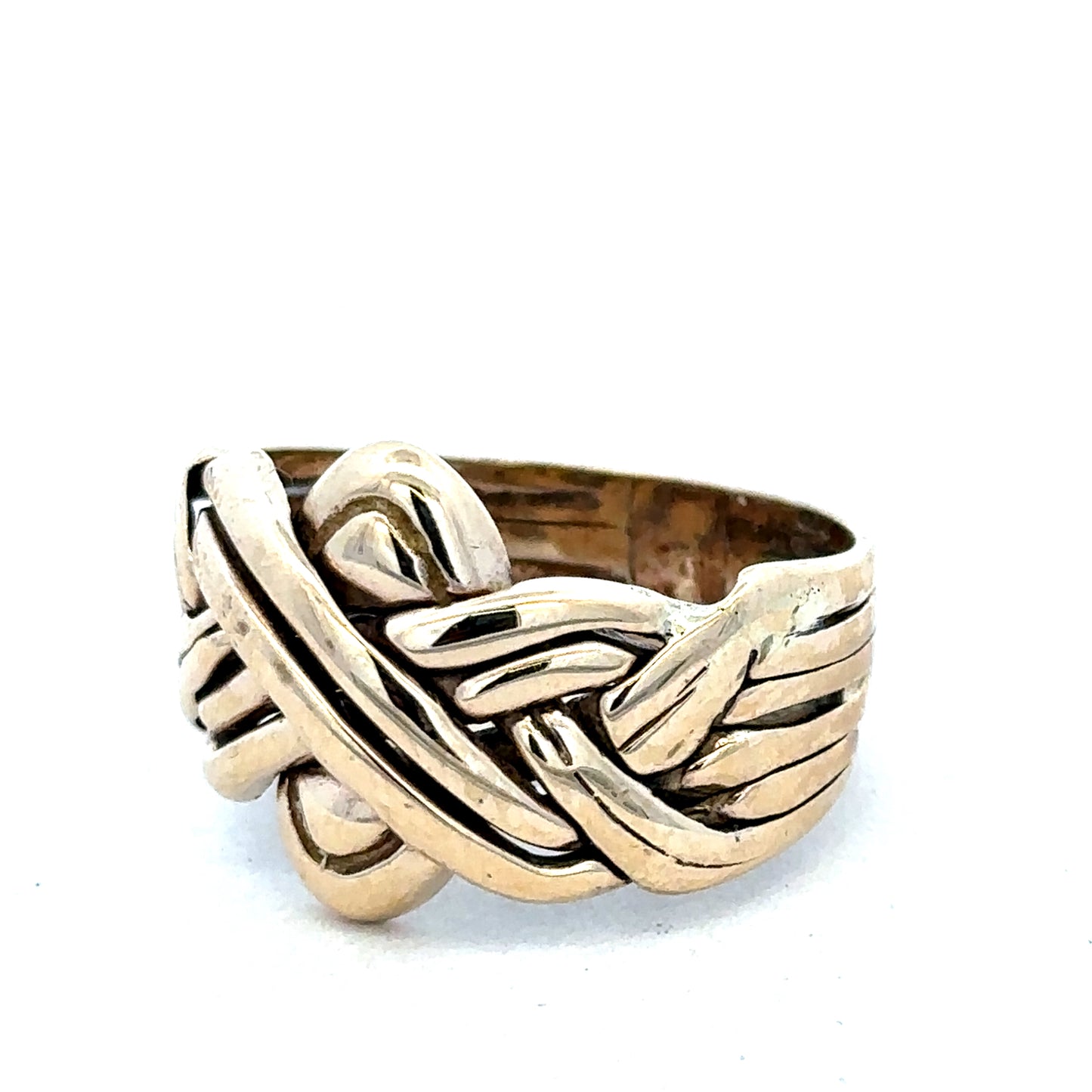 9ct yellow gold puzzle ring in size U by Reeves and Sons, featuring interlocking band design with a polished finish.