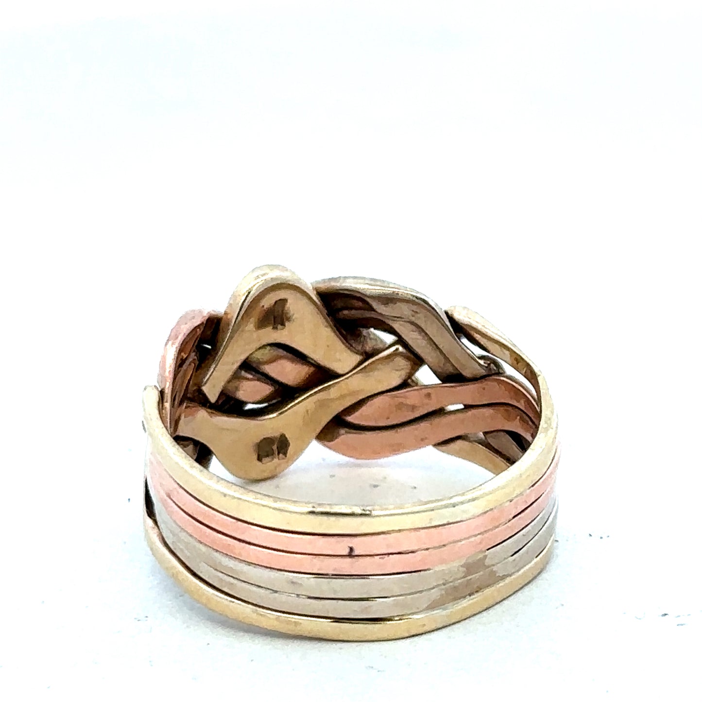 9ct yellow gold puzzle ring in size U1/2 featuring interlocking band design, crafted by Reeves and Sons.