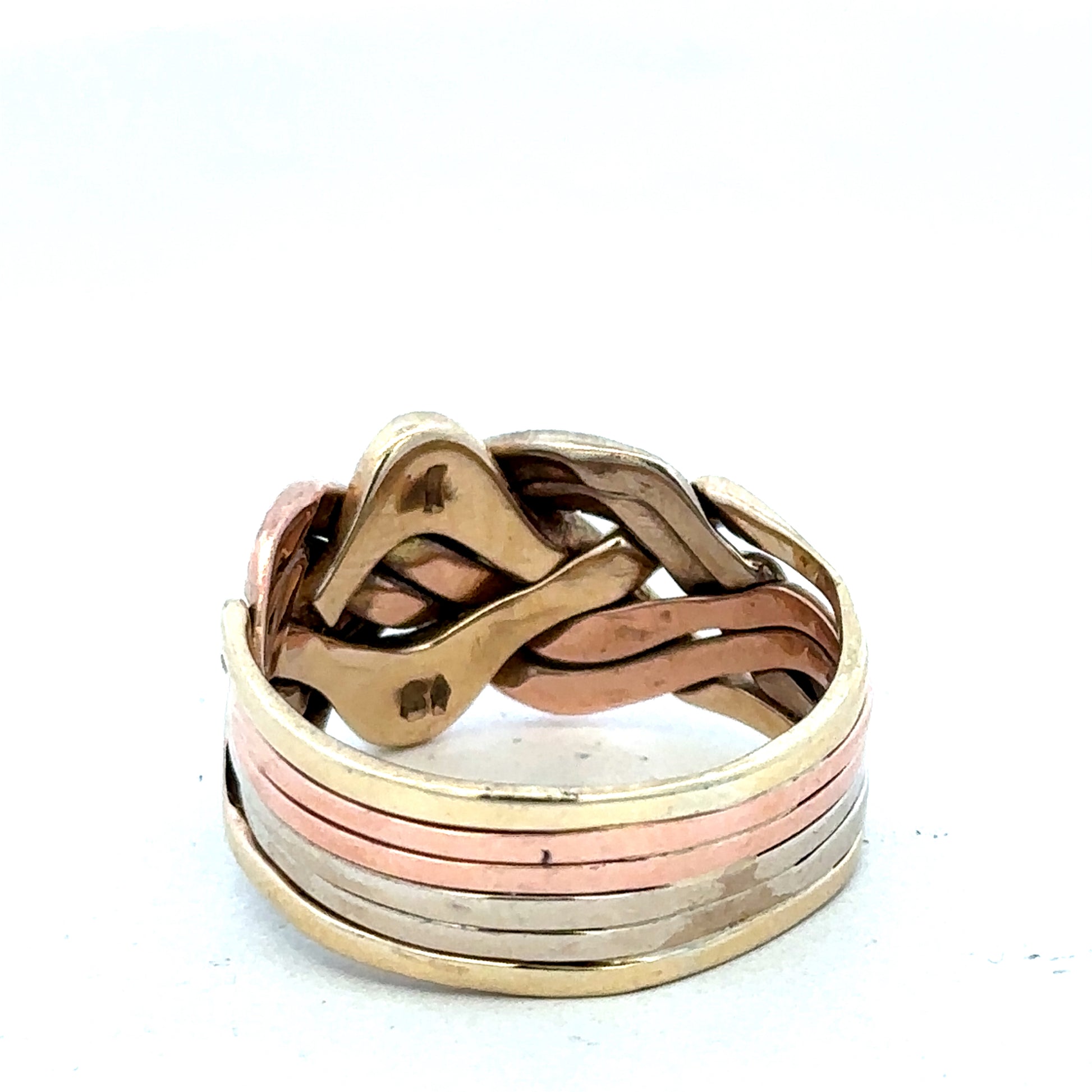 9ct yellow gold puzzle ring in size U1/2 featuring interlocking band design, crafted by Reeves and Sons.