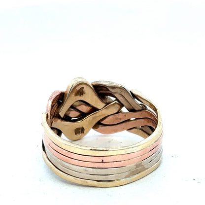 9ct yellow gold puzzle ring in size U1/2 featuring interlocking band design, crafted by Reeves and Sons.